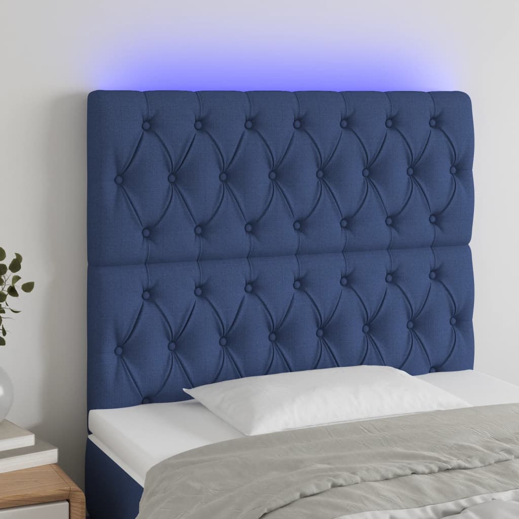 sengegavl med LED-lys 90x7x118/128 cm stof blå