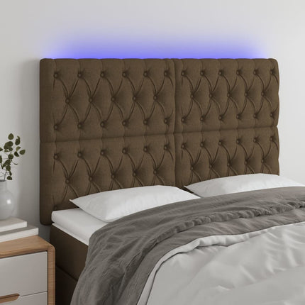 sengegavl med LED-lys 144x7x118/128 cm stof mørkebrun
