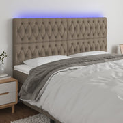 sengegavl med LED-lys 180x7x118/128 cm stof gråbrun