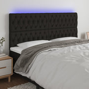 sengegavl med LED-lys 200x7x118/128 cm stof sort