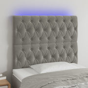 sengegavl med LED-lys 100x7x118/128 cm fløjl lysegrå