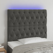 sengegavl med LED-lys 100x7x118/128 cm fløjl mørkegrå