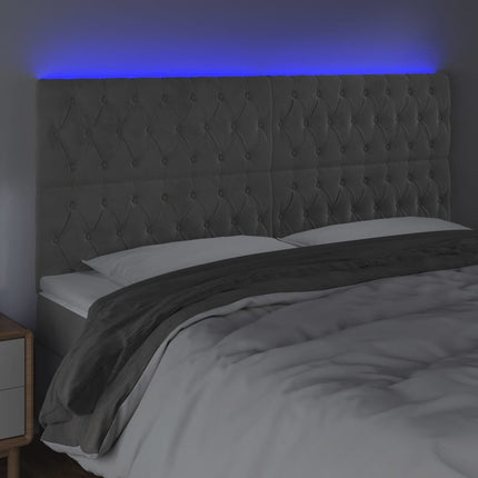 sengegavl med LED-lys 180x7x118/128 cm fløjl lysegrå