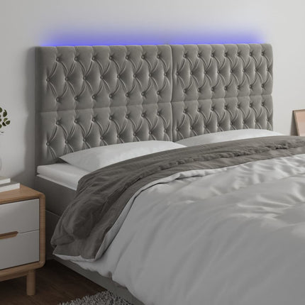 sengegavl med LED-lys 180x7x118/128 cm fløjl lysegrå