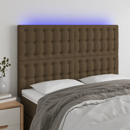 sengegavl med LED-lys 144x5x118/128 cm stof mørkebrun