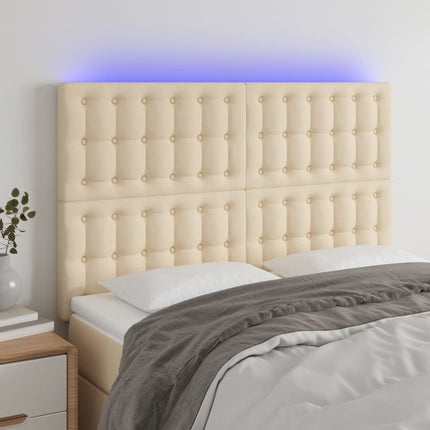 sengegavl med LED-lys 144x5x118/128 cm stof cremefarvet