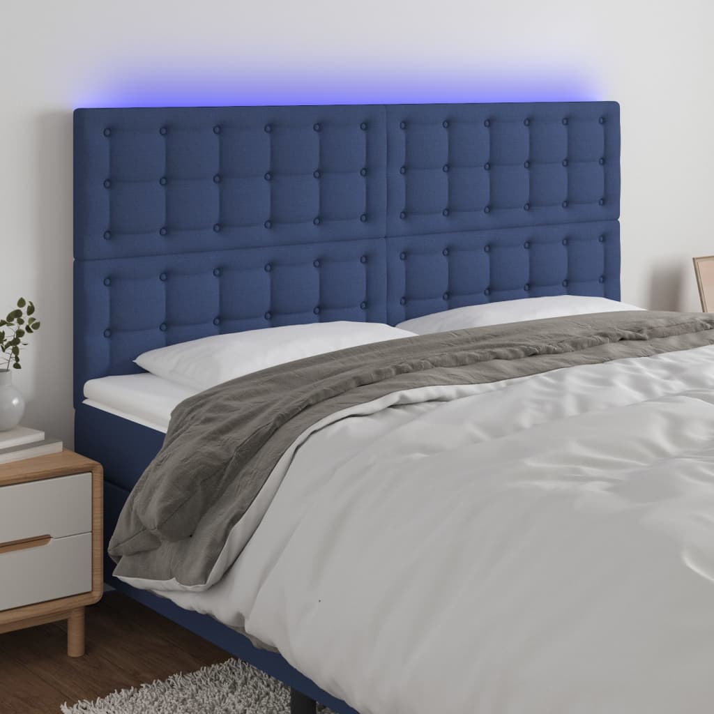 sengegavl med LED-lys 200x5x118/128 cm stof blå