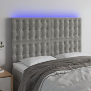 sengegavl med LED-lys 144x5x118/128 cm fløjl lysegrå