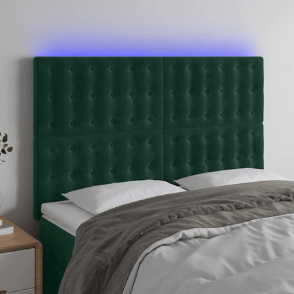 sengegavl med LED-lys 144x5x118/128 cm fløjl mørkegrøn