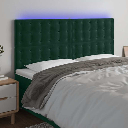 sengegavl med LED-lys 180x5x118/128 cm fløjl mørkegrøn