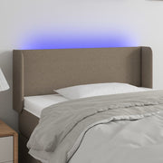 sengegavl med LED-lys 83x16x78/88 cm stof gråbrun
