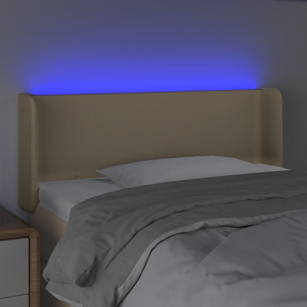 sengegavl med LED-lys 83x16x78/88 cm stof cremefarvet