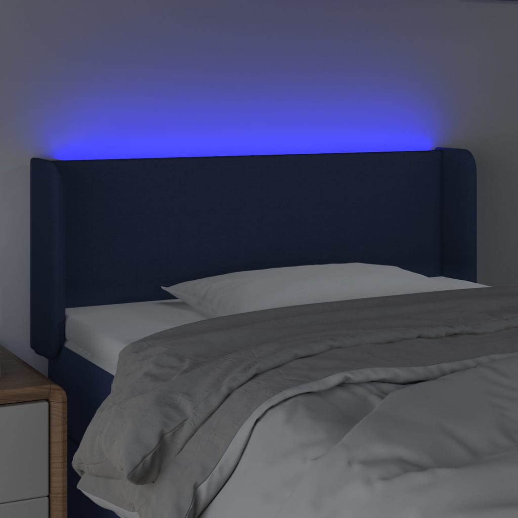 sengegavl med LED-lys 83x16x78/88 cm stof blå