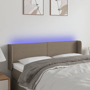 sengegavl med LED-lys 147x16x78/88 cm stof gråbrun