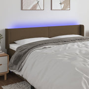 sengegavl med LED-lys 163x16x78/88 cm stof mørkebrun