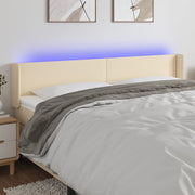 sengegavl med LED-lys 203x16x78/88 cm stof cremefarvet