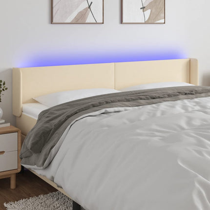 sengegavl med LED-lys 203x16x78/88 cm stof cremefarvet