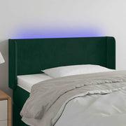 sengegavl med LED-lys 83x16x78/88 cm fløjl Mørkegrøn