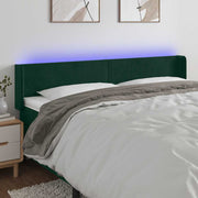sengegavl med LED-lys 183x16x78/88 cm fløjl mørkegrøn