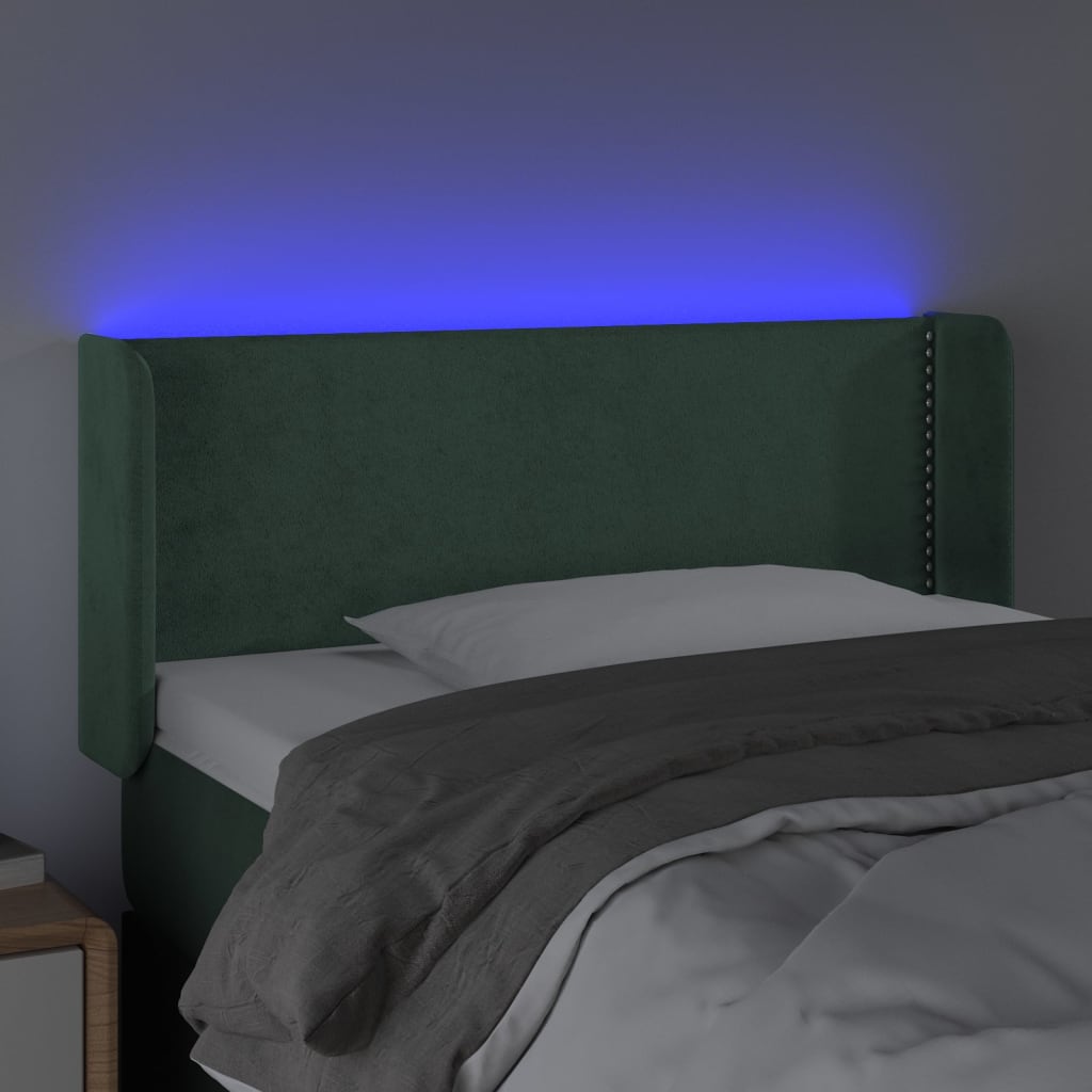 sengegavl med LED-lys 103x16x78/88 cm fløjl mørkegrøn