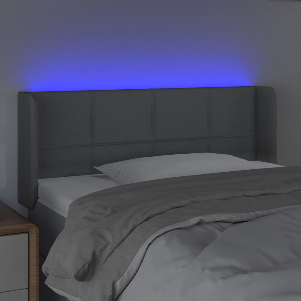 sengegavl med LED-lys 103x16x78/88 cm stof lysegrå
