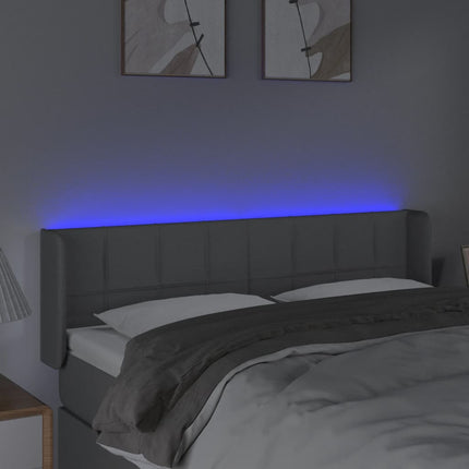 sengegavl med LED-lys 147x16x78/88 cm stof lysegrå