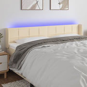 sengegavl med LED-lys 163x16x78/88 cm stof cremefarvet