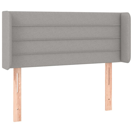 sengegavl med LED-lys 83x16x78/88 cm stof lysegrå