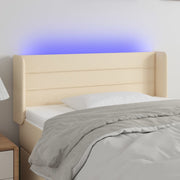 sengegavl med LED-lys 103x16x78/88 cm stof cremefarvet
