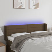 sengegavl med LED-lys 147x16x78/88 cm stof mørkebrun