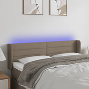 sengegavl med LED-lys 147x16x78/88 cm stof gråbrun