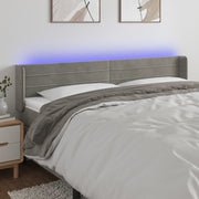 sengegavl med LED-lys 163x16x78/88 cm fløjl lysegrå