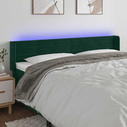 sengegavl med LED-lys 203x16x78/88 cm fløjl mørkegrøn