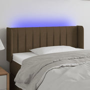 sengegavl med LED-lys 83x16x78/88 cm stof mørkebrun