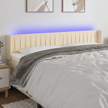 sengegavl med LED-lys 183x16x78/88 cm stof cremefarvet