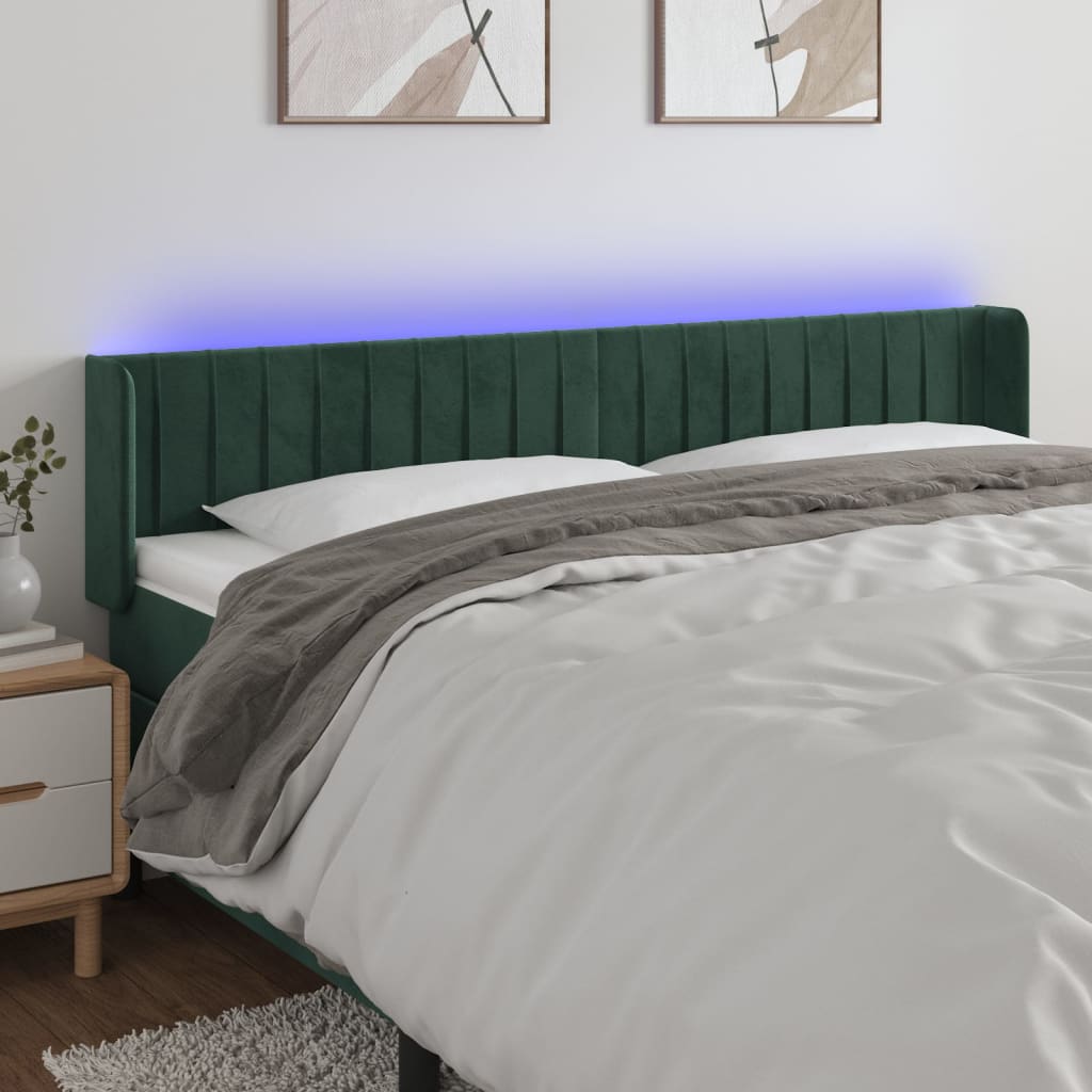 sengegavl med LED-lys 163x16x78/88 cm fløjl mørkegrøn