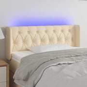 sengegavl med LED-lys 103x16x78/88 cm stof cremefarvet