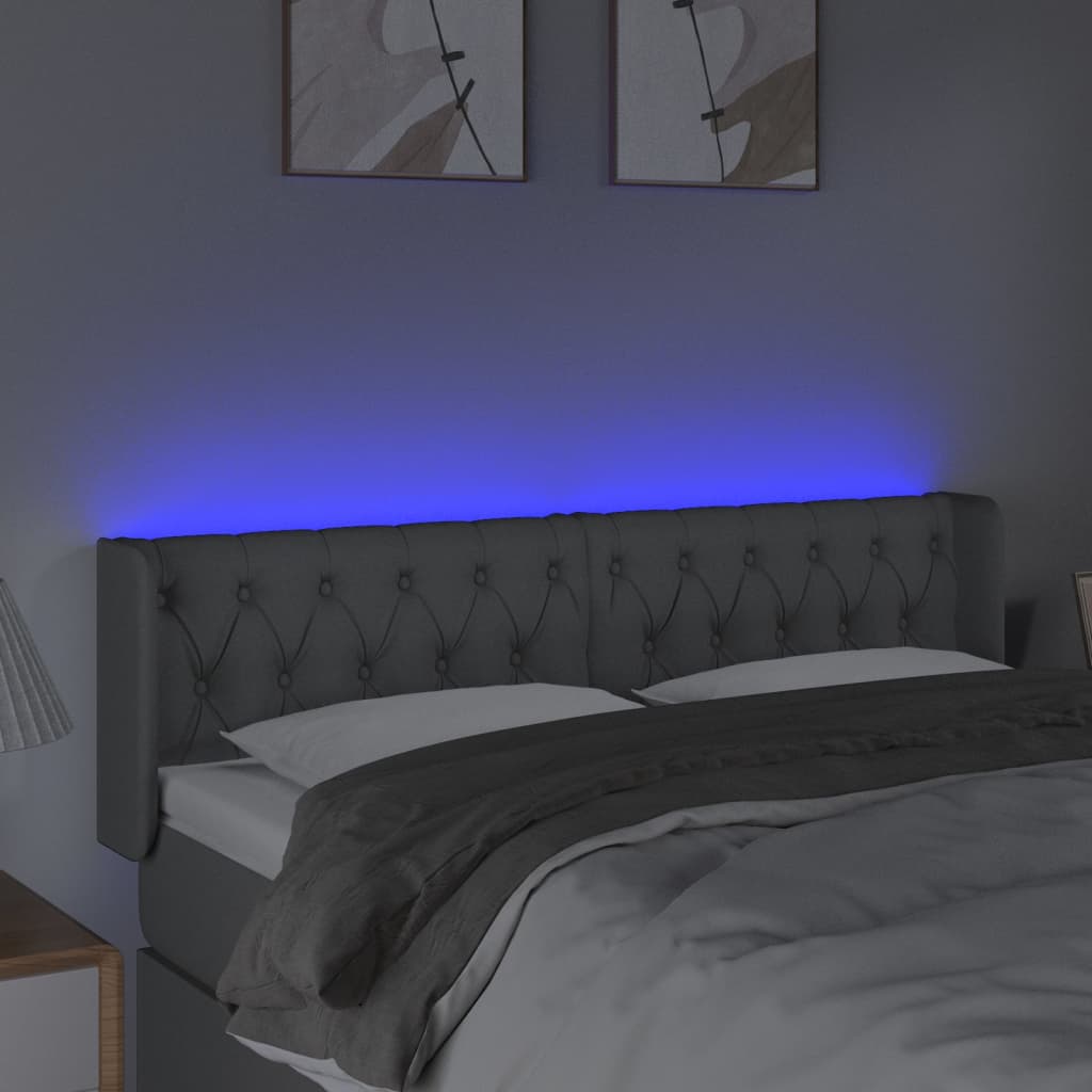 sengegavl med LED-lys 163x16x78/88 cm stof lysegrå