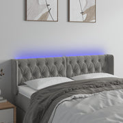 sengegavl med LED-lys 147x16x78/88 cm fløjl lysegrå