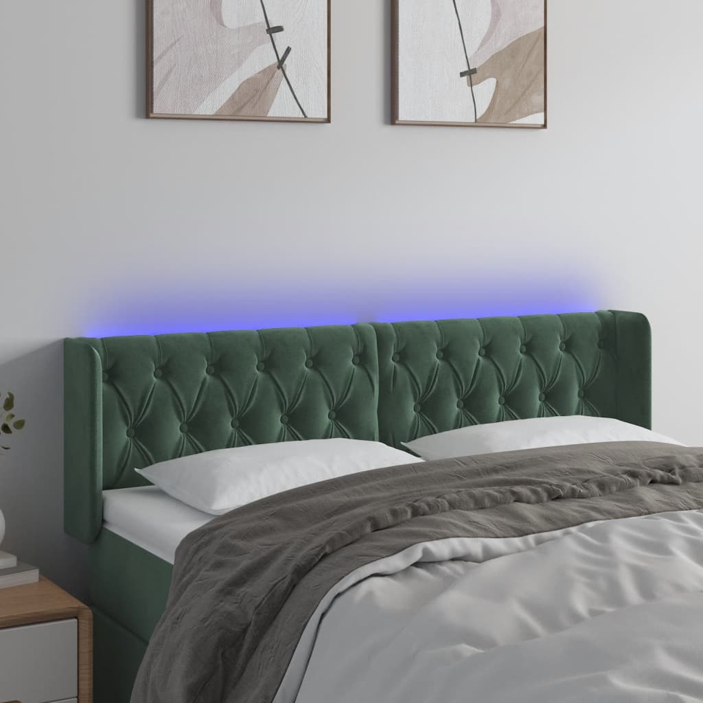 sengegavl med LED-lys 147x16x78/88 cm fløjl mørkegrøn