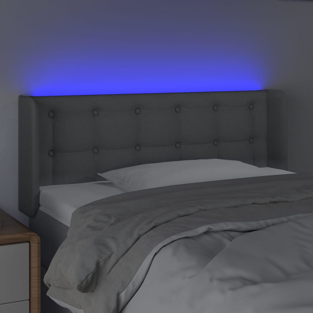 sengegavl med LED-lys 83x16x78/88 cm stof lysegrå