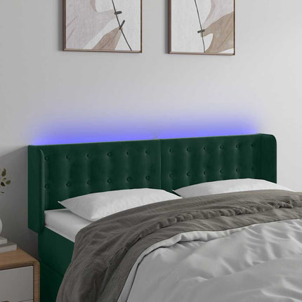 sengegavl med LED-lys 147x16x78/88 cm fløjl mørkegrøn