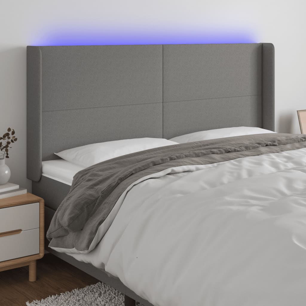 sengegavl med LED-lys 163x16x118/128 cm stof mørkegrå