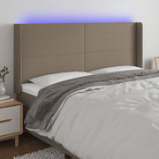 sengegavl med LED-lys 183x16x118/128 cm stof gråbrun