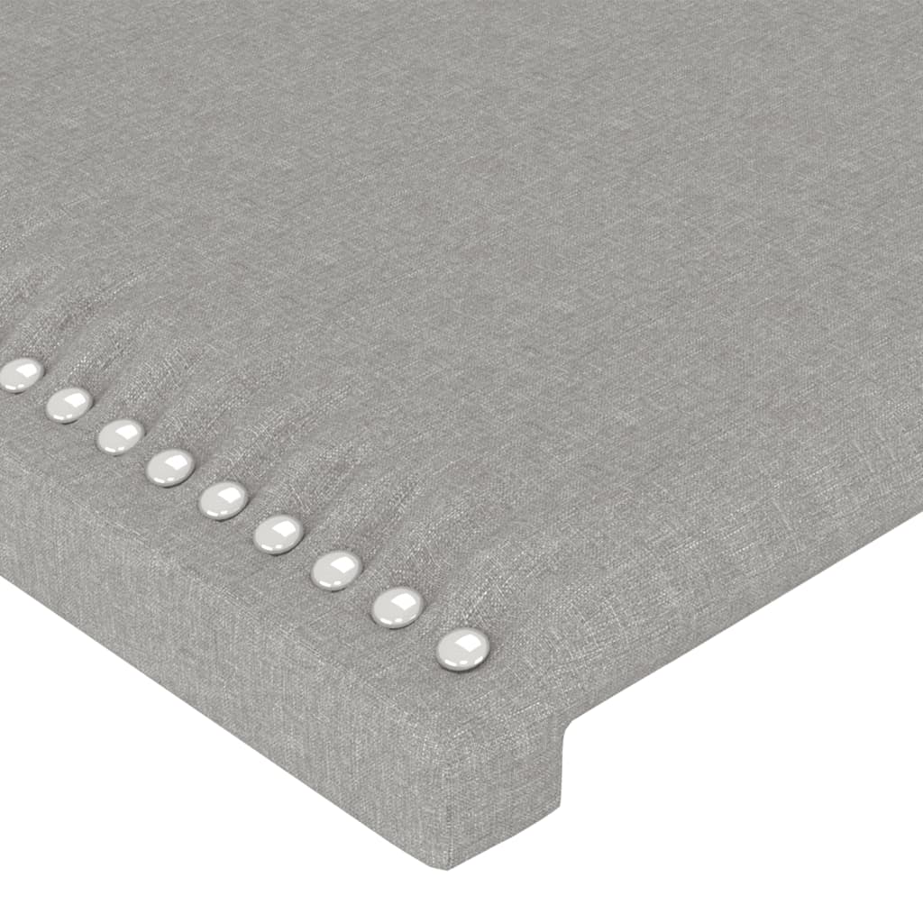 sengegavl med LED-lys 147x16x118/128 cm stof lysegrå