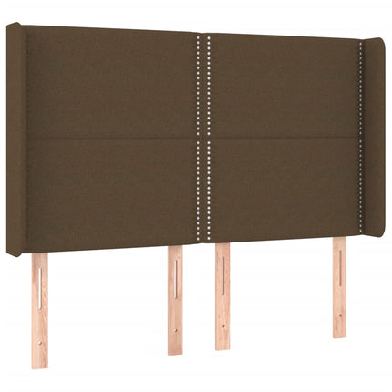 sengegavl med LED-lys 147x16x118/128 cm stof mørkebrun