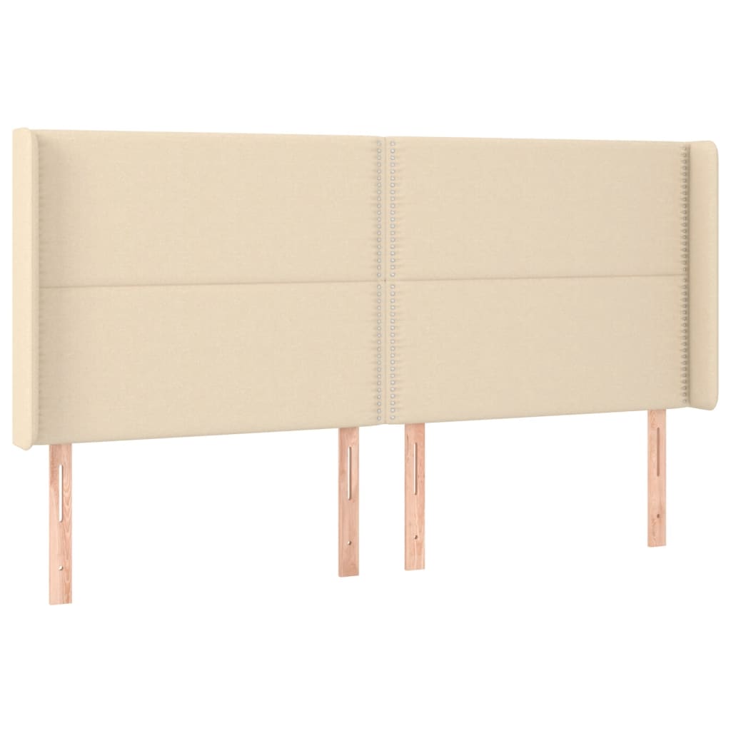 sengegavl med LED-lys 183x16x118/128 cm stof cremefarvet
