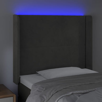 sengegavl med LED-lys 83x16x118/128 cm fløjl mørkegrå