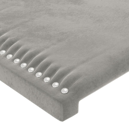 sengegavl med LED-lys 103x16x118/128 cm fløjl lysegrå