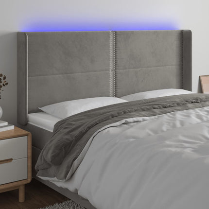 sengegavl med LED-lys 203x16x118/128 cm fløjl lysegrå